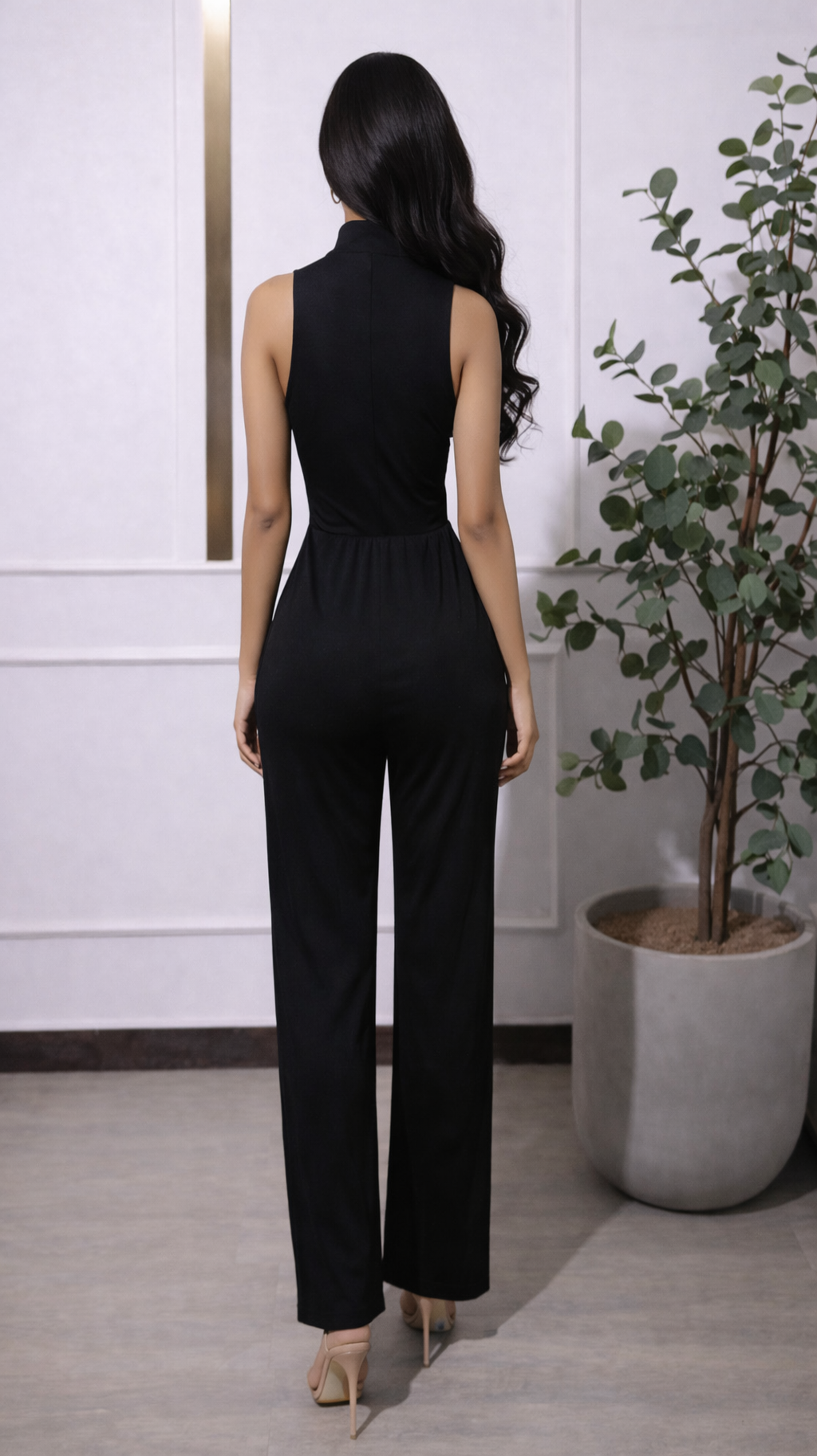 A Black Sleeveless Wide-leg Jumpsuit With A Ruffled Collar And An Elasticated Waist