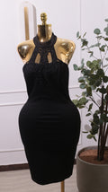 A Black Halter Neck Bodycon Dress With Lace Detailing On The Neckline