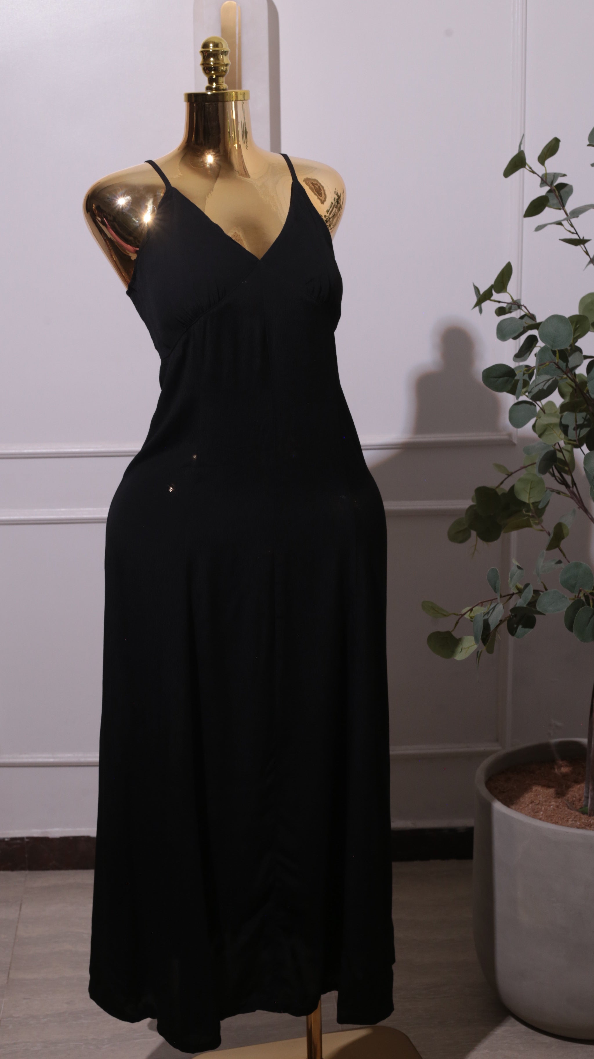 A Black Long Dress With A V-neck