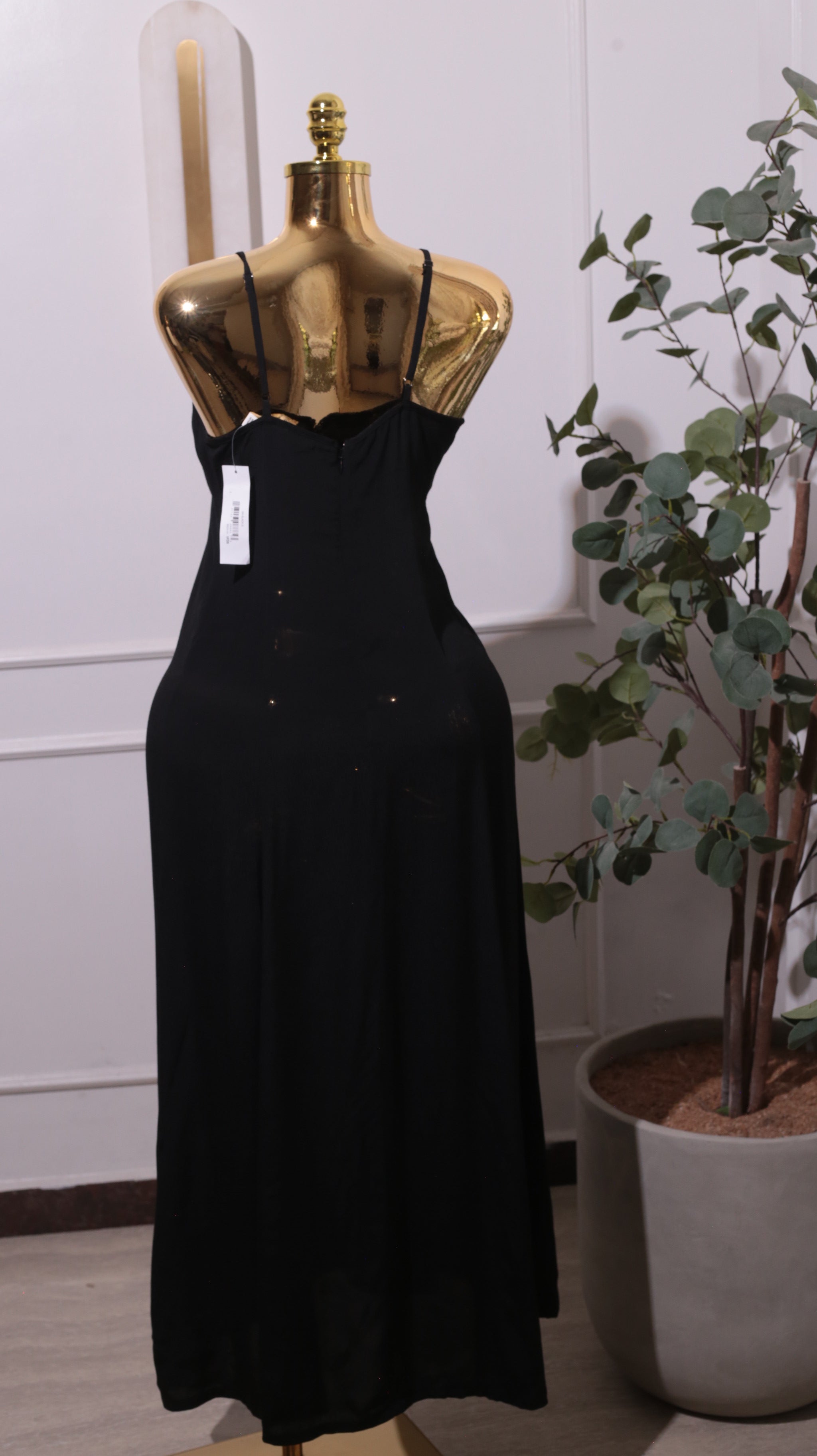A Black Long Dress With A V-neck