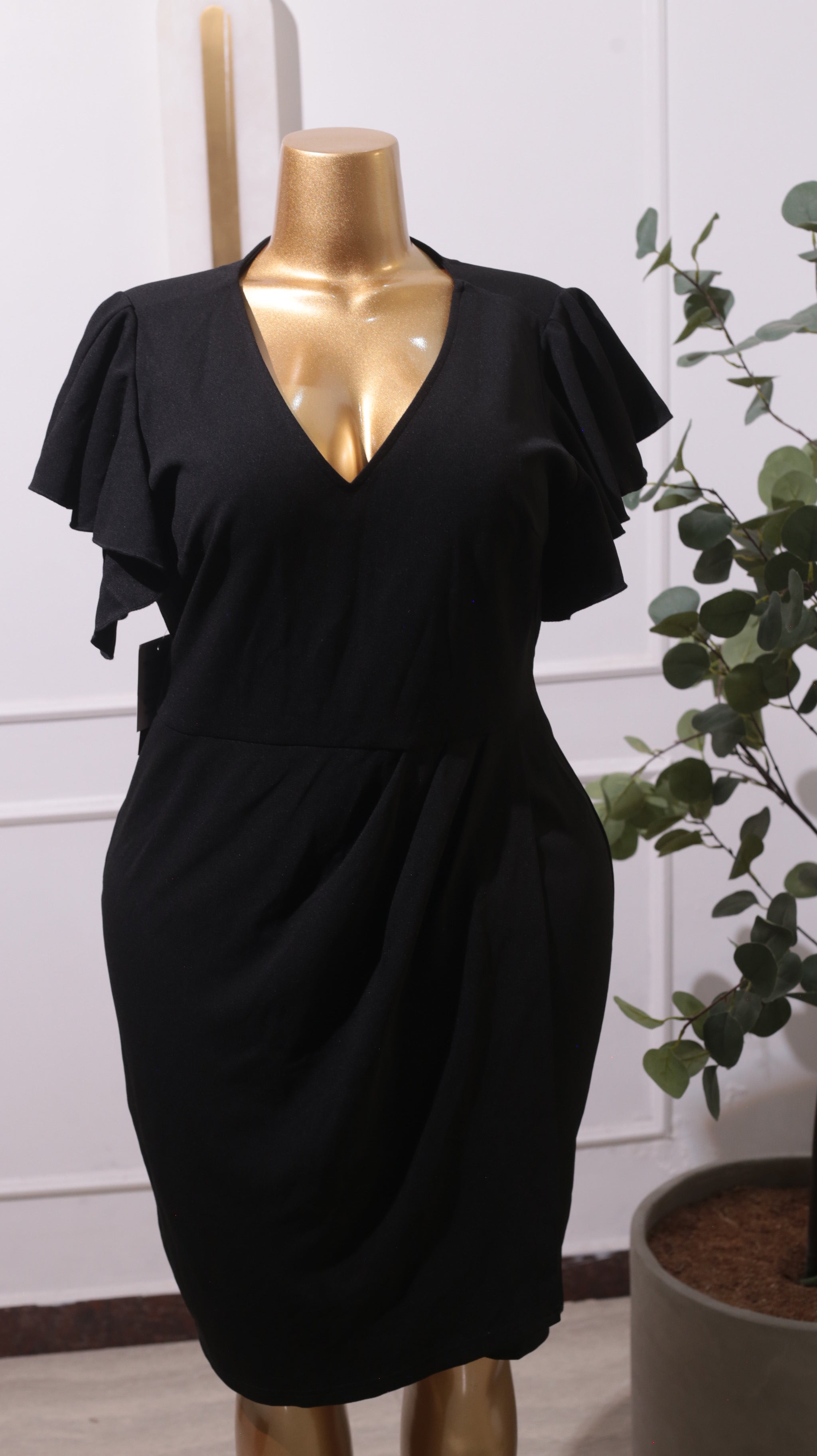 A Black V-neck Bodycon Wrap Dress With Short Ruffle Sleeves