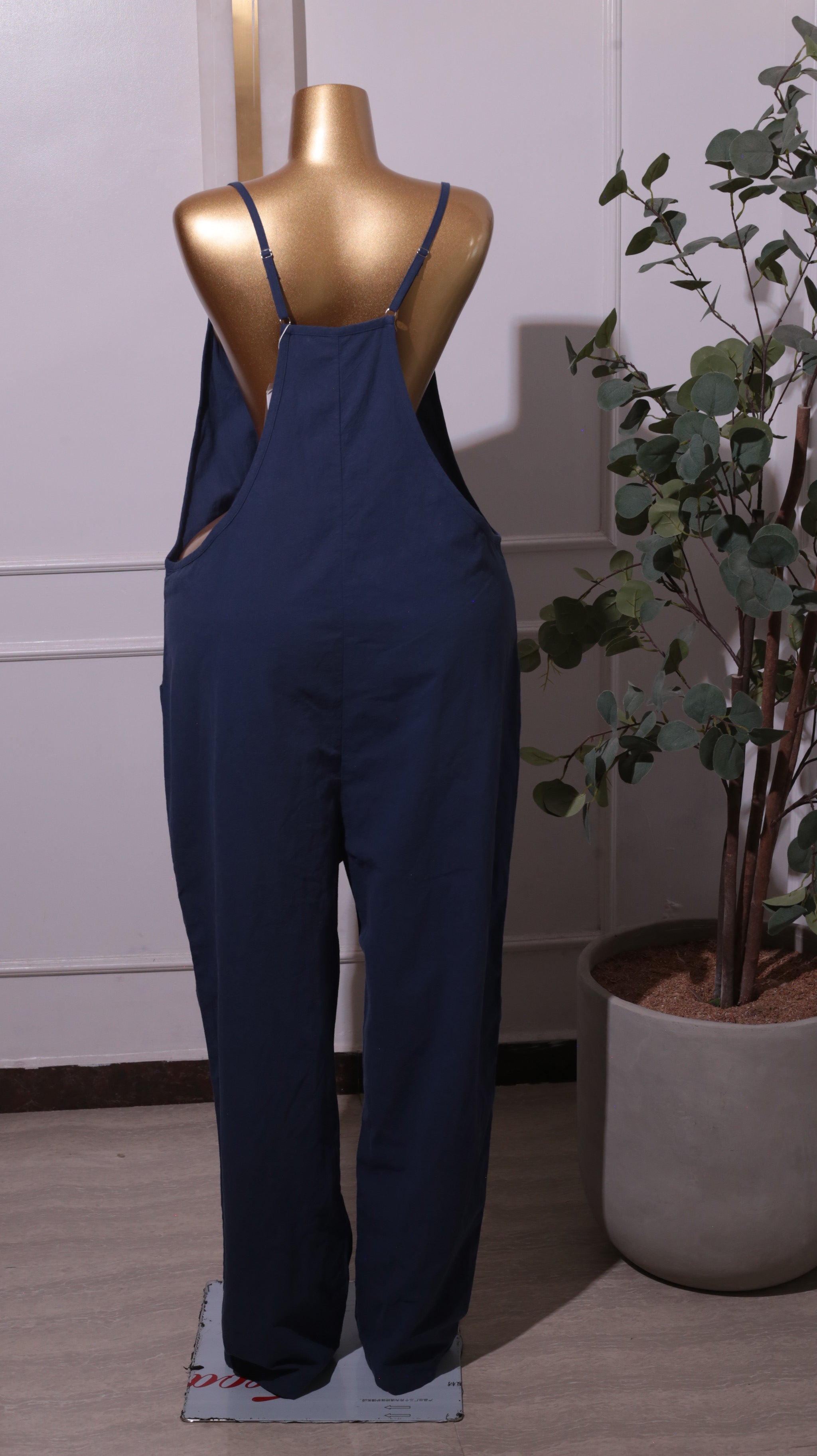 A Navy Blue Women's Spaghetti Jumpsuit With Pockets