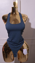 A Sleeveless Racerback Thong Bodysuit In A Deep Navy Or Blue Color
