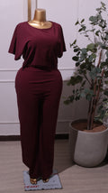 A Women's Short-sleeve, Wide-leg Jumpsuit In A Burgundy Or Wine Red Color