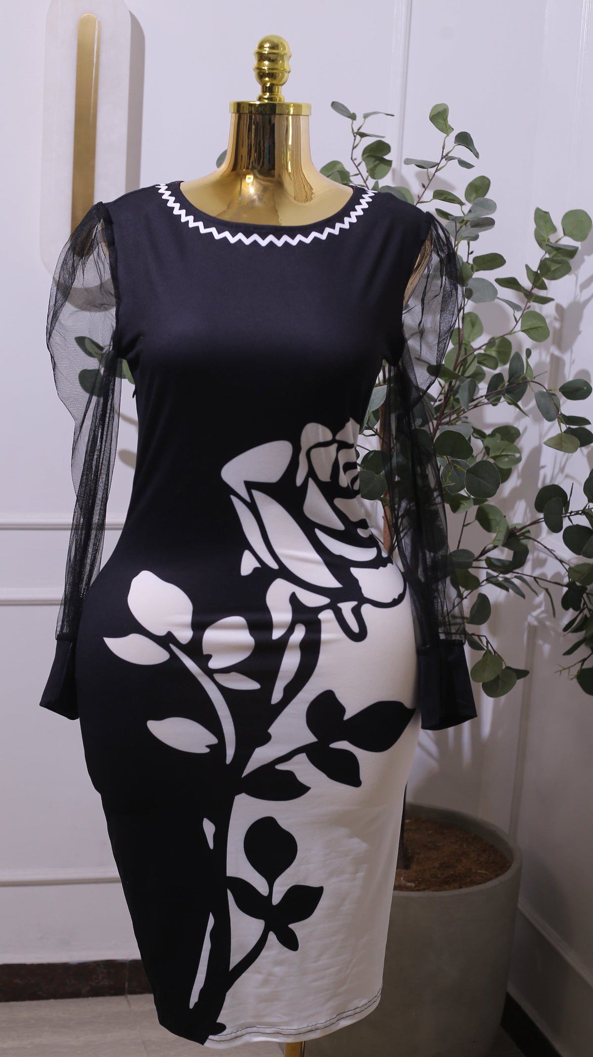 Black And White Bodycon Dress With A Floral Design And Sheer Sleeves