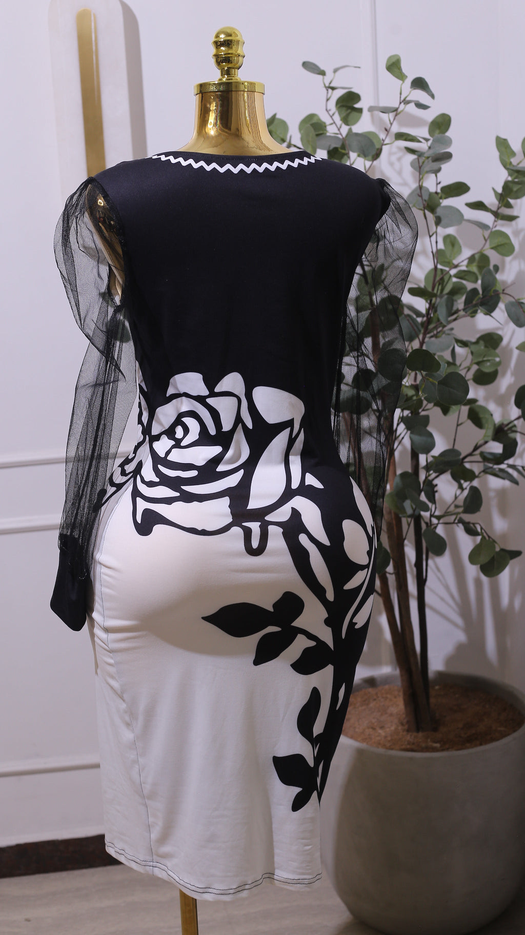 Black And White Bodycon Dress With A Floral Design And Sheer Sleeves