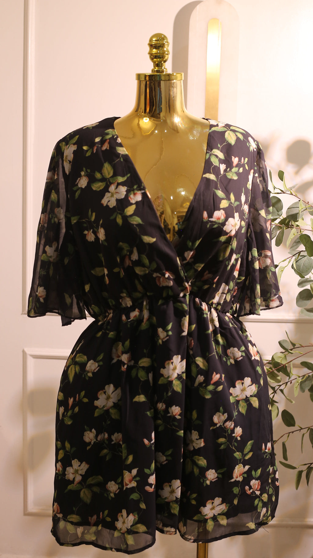 Black Chiffon Mini Dress With A Delicate White And Green Floral Print