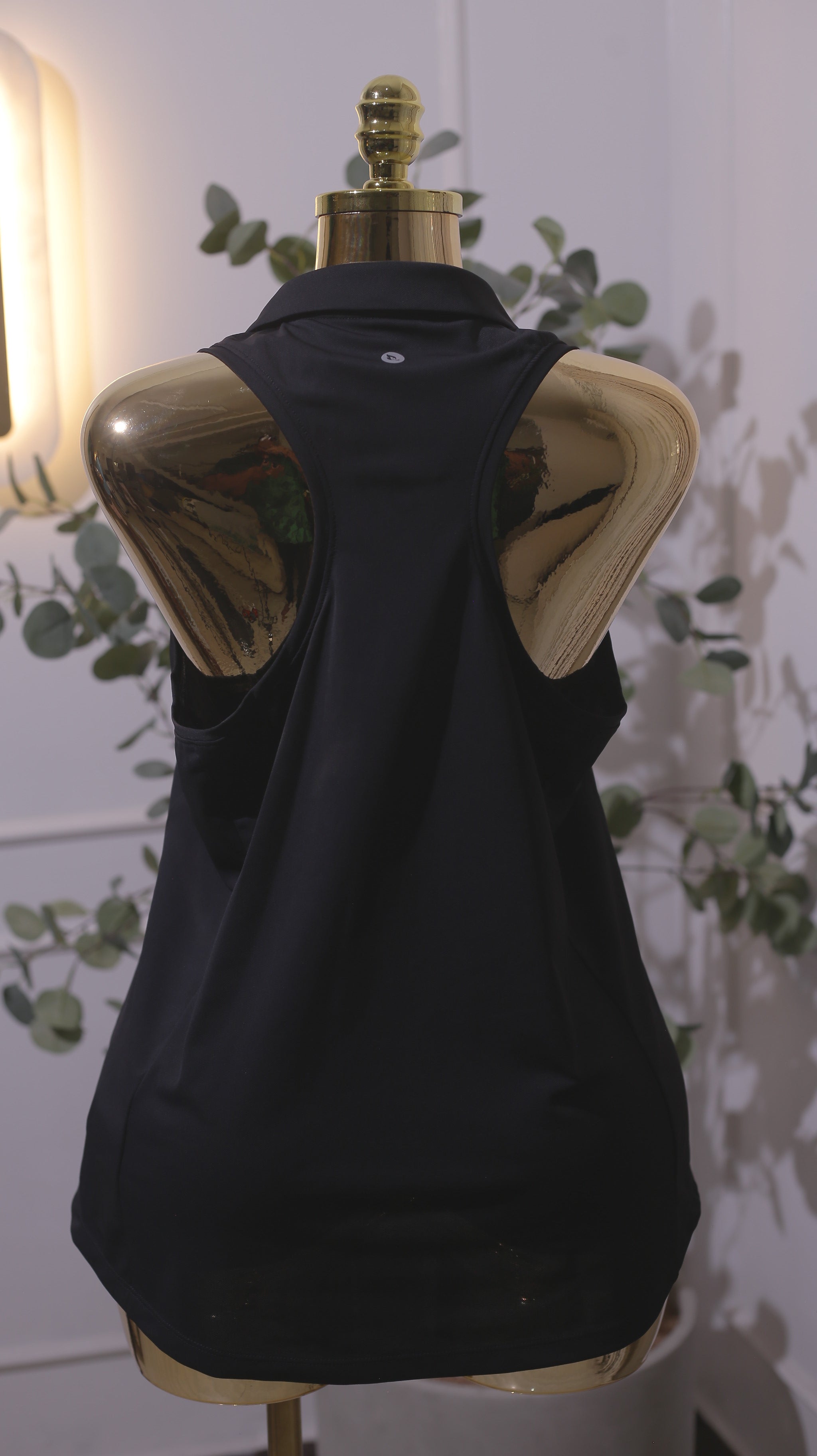 Black Sleeveless Tech Polo Top