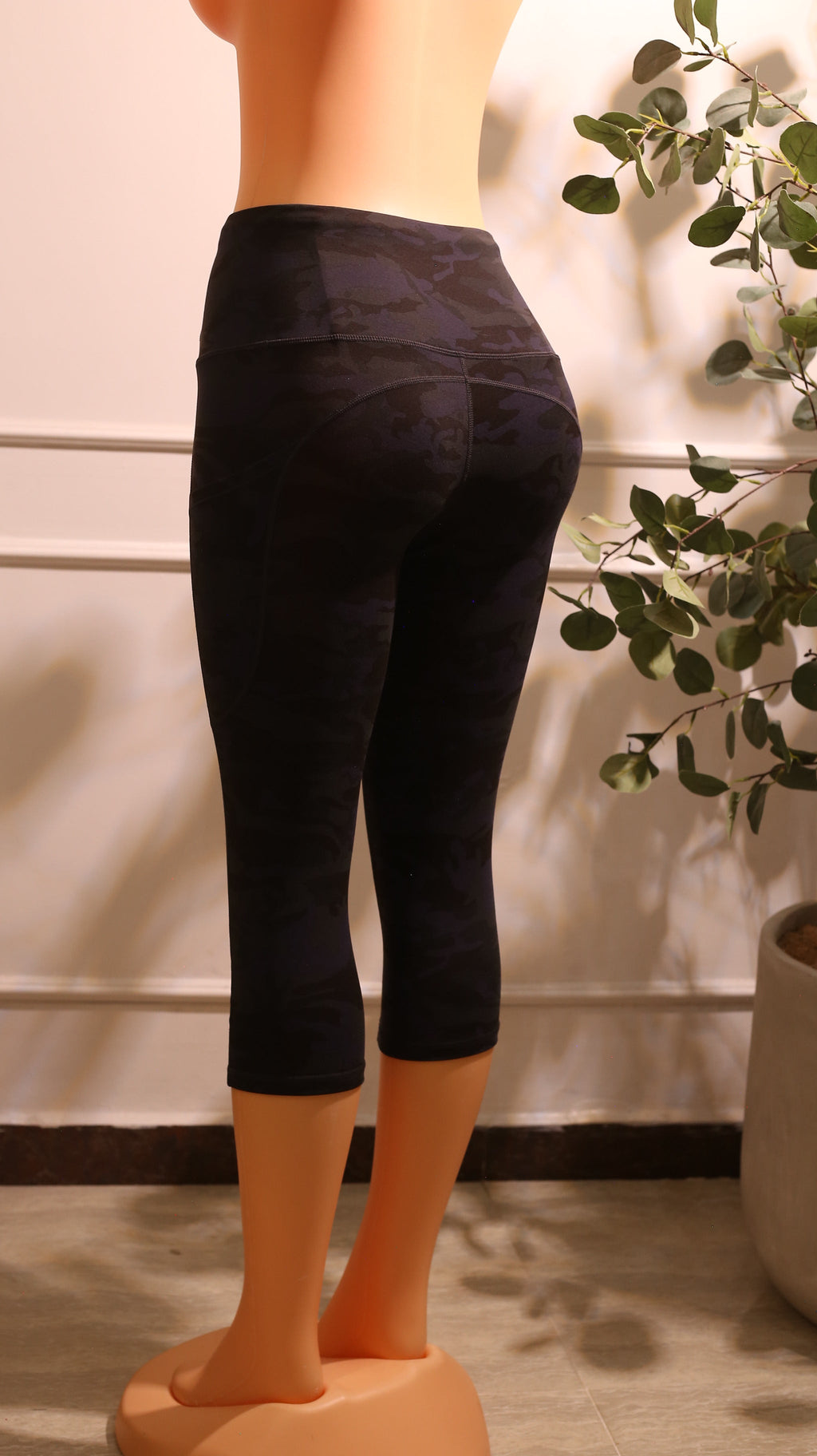 leggings in a black and purple camouflage pattern