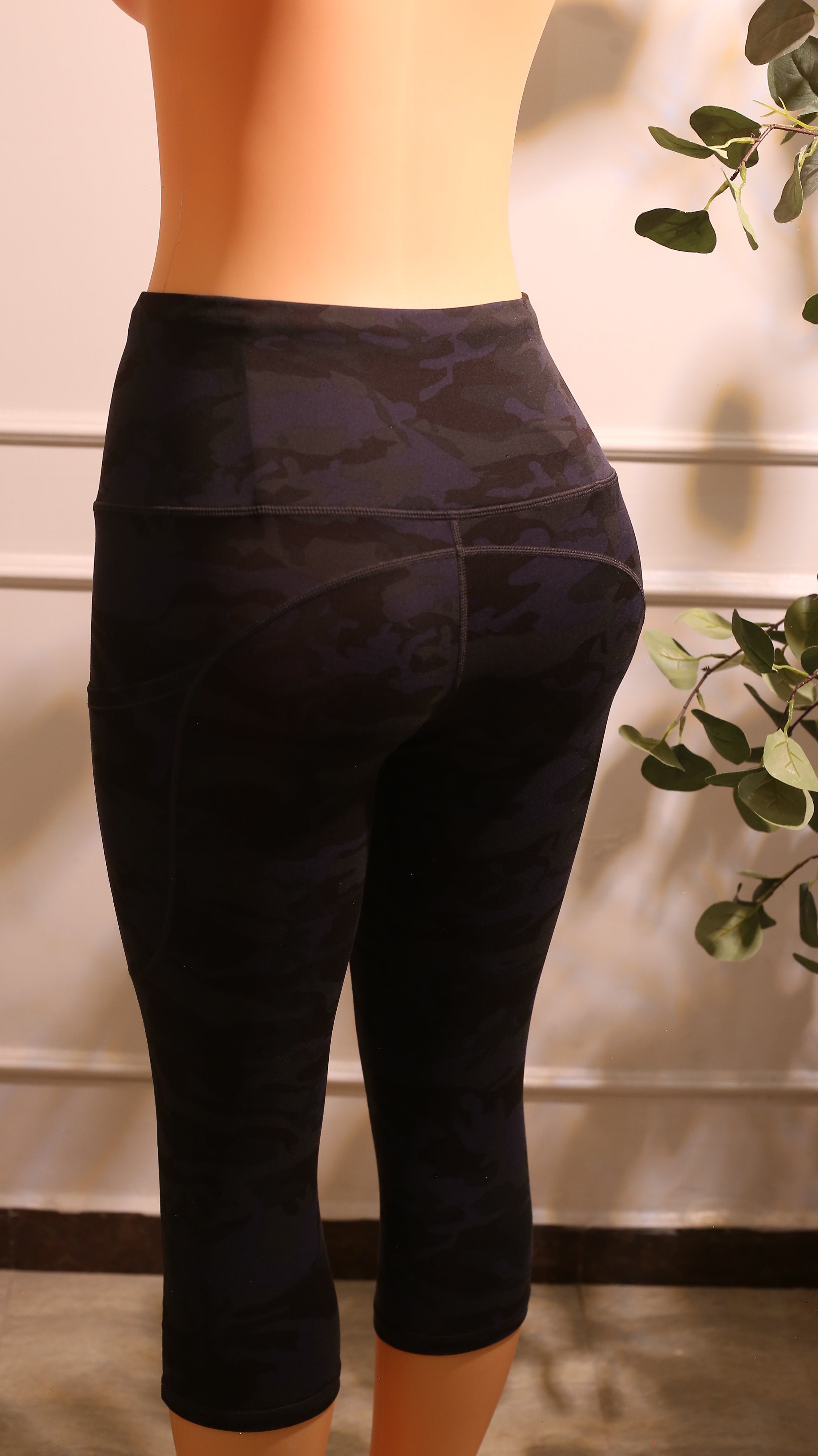 leggings in a black and purple camouflage pattern