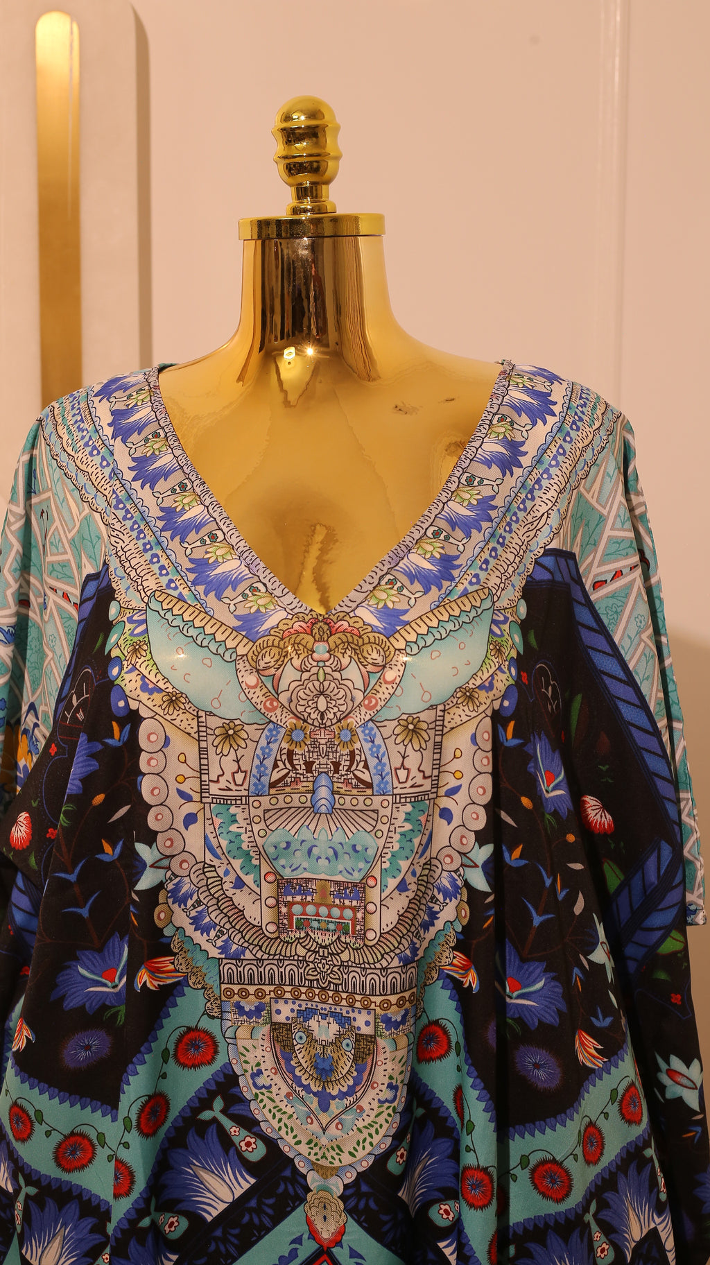 Multicolored Kaftan Dress With A V-Shaped Neckline And Elaborate Patterns