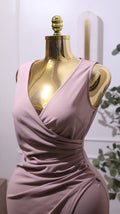 Sleeveless, V-neck, Ruched Bodycon Cocktail Dress In A Mauve Or Dusty Pink Color With A Tulip Hem. (
