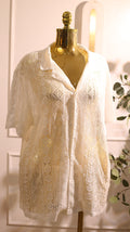 White Short-Sleeve Button-Up Shirt With A Lace Pattern