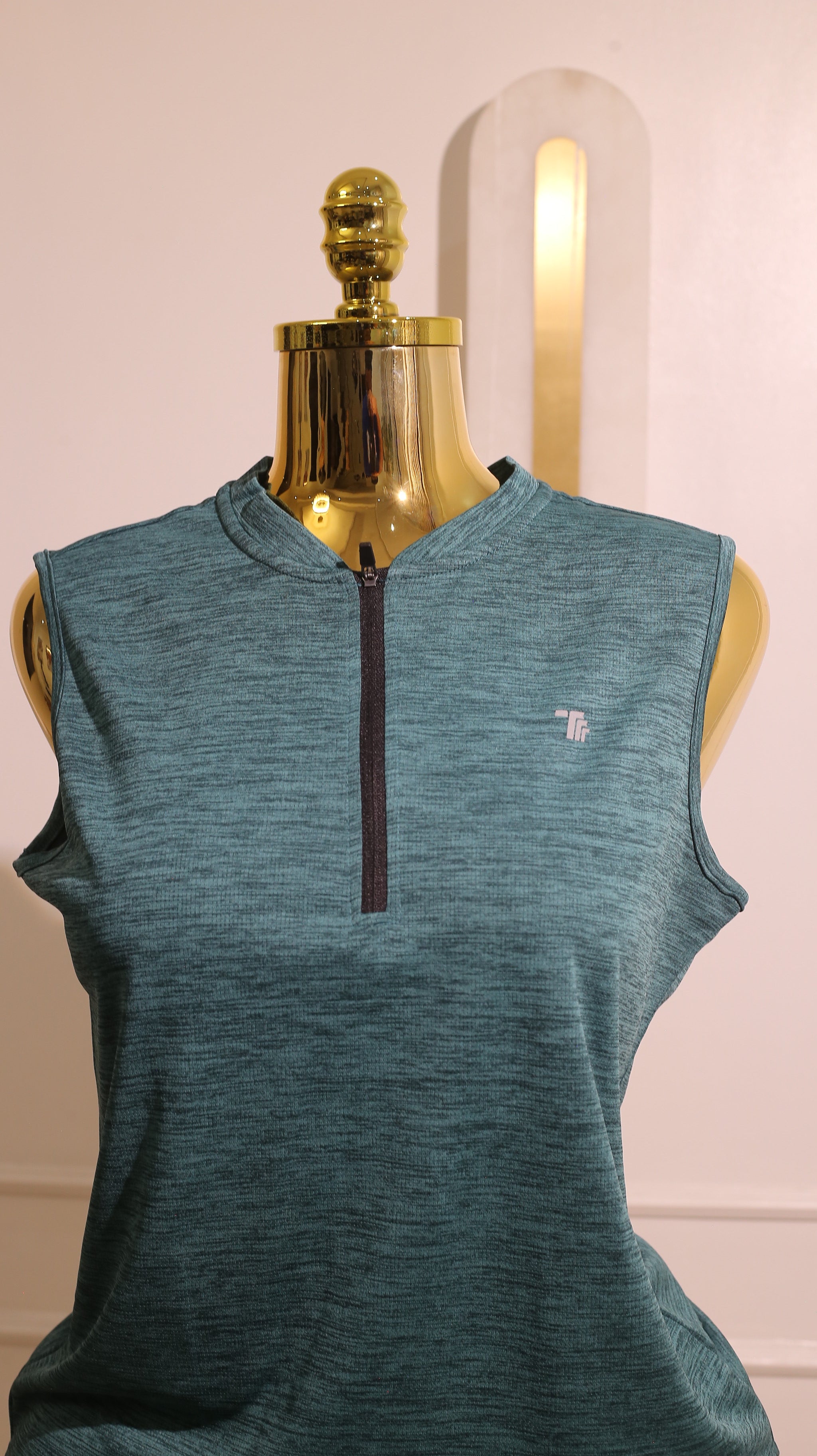 Women'S Sleeveless Golf Polo Shirt In Teal With A Zip-Up Collarless Design